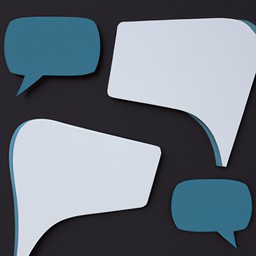 A paper cutout of chat bubbles indicating negotiation for a car for sale