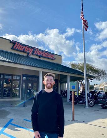 GL Digital founder Gary Lewis Cheetham standing outside the Harley Davidson Dealership Mike Bruno's Freedom Harley Davidson Baton Rouge Louisiana