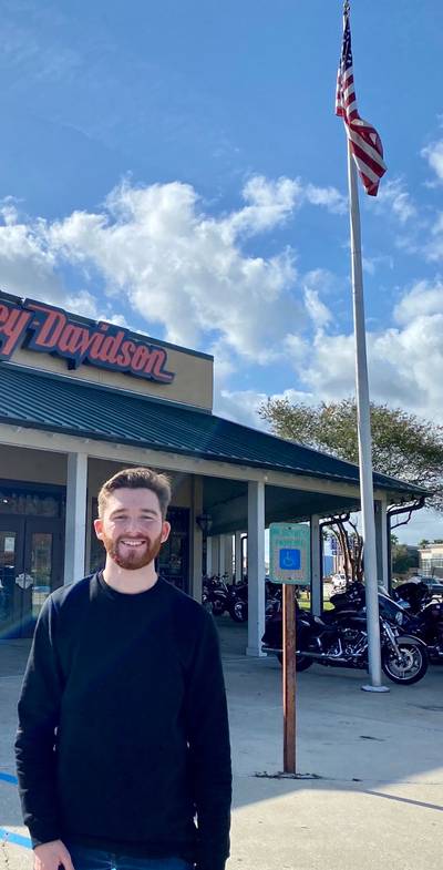 GL Digital founder Gary Lewis Cheetham standing outside the Harley Davidson Dealership Mike Bruno's Freedom Harley Davidson Baton Rouge Louisiana